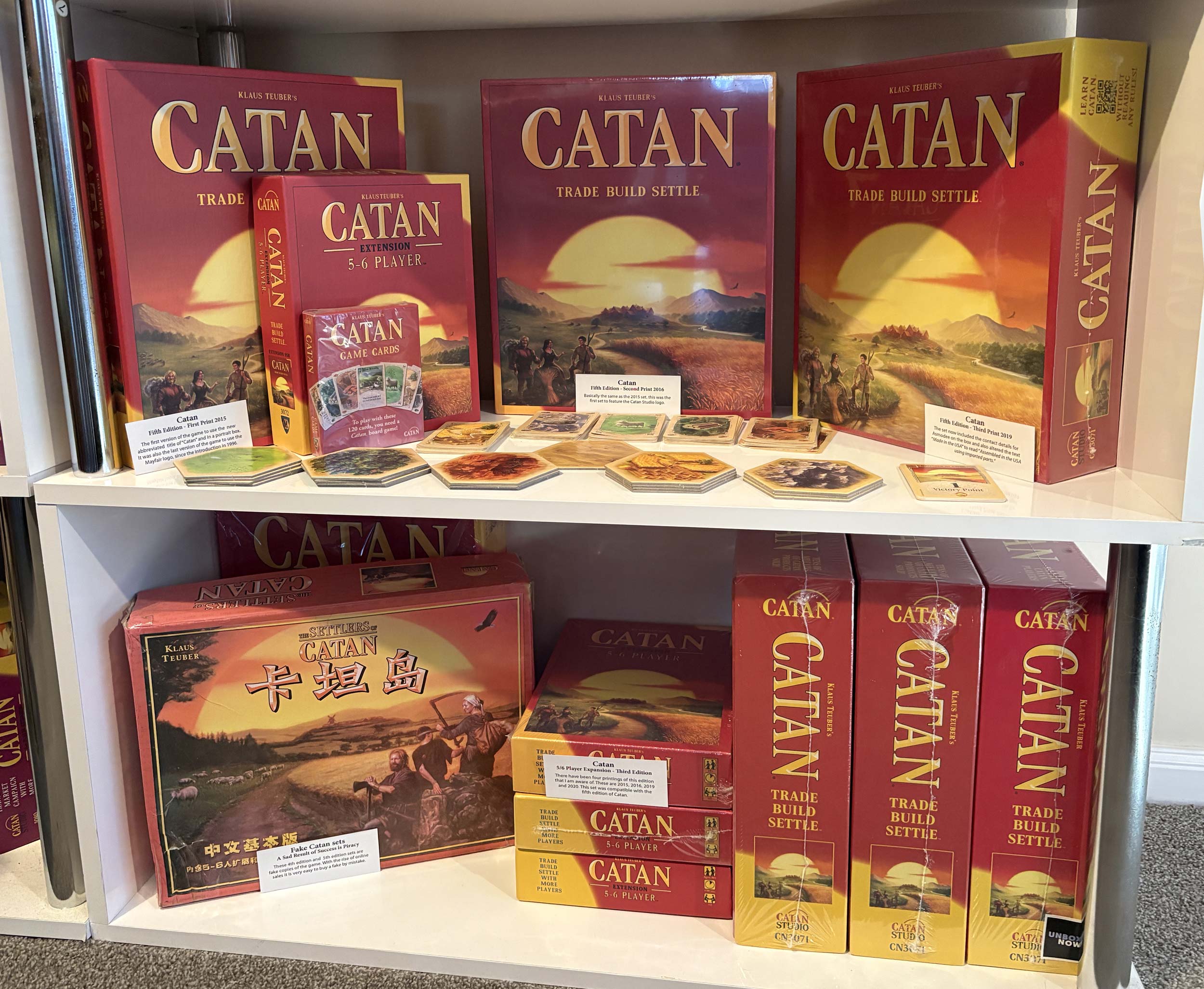 Shelf Four and Five - Catan 5E and Fakes Image